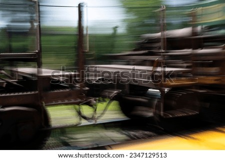 A blurry and abstracted view of a moving train