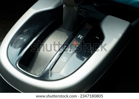 Close up photo of gear shift in a car, after some edits. Royalty-Free Stock Photo #2347180805