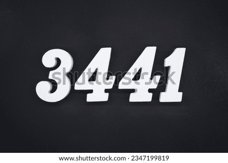 Black for the background. The number 3441 is made of white painted wood.