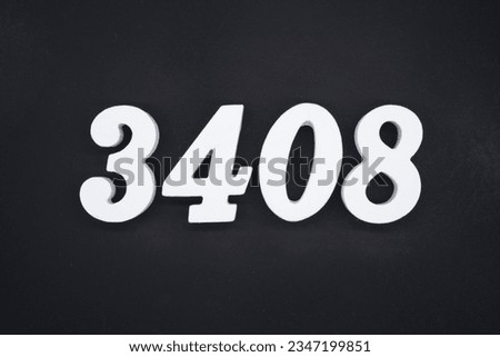 Black for the background. The number 3408 is made of white painted wood.