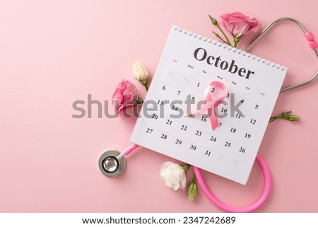October is for raising breast cancer awareness. Top view picture featuring calendar, stethoscope and pink ribbon on pastel pink isolated backdrop, with copyspace for text or advertising