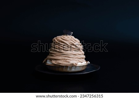 Classic Dessert , French Cake, Mont Blanc , Black background Royalty-Free Stock Photo #2347256315