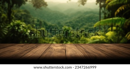 The empty wooden table top with blur background of Amazon rainforest. Exuberant image.