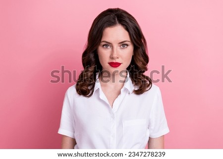 Photo of charming adorable young girl dressed white shirt smiling isolated pink color background