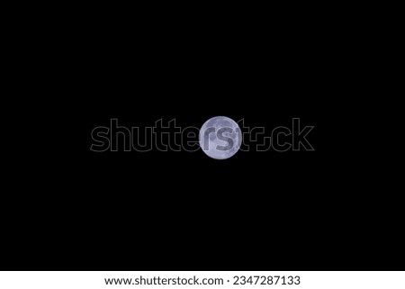 Full moon on a black sky horizontal