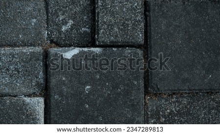 Paving stone pavement texture. Cobblestone pavement top view