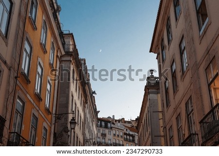 Lisbon old buildings at nightfall. Royalty-Free Stock Photo #2347290733