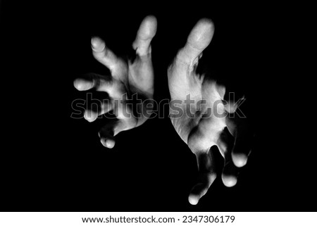 hands close-up black and white background	