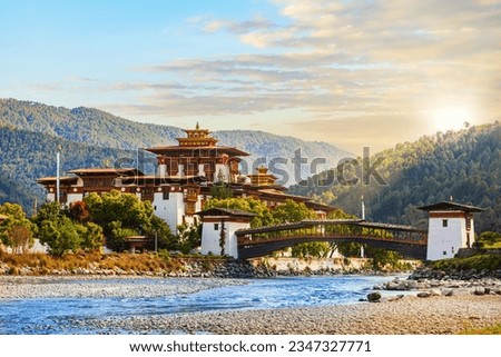 Punakha Dzong at the Mo Chhu river in Bhutan Royalty-Free Stock Photo #2347327771