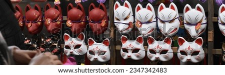 Japanese Mask Stand in a Festival, right view