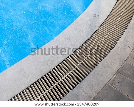 high view. Grid for water circulation on the side of the pool.
