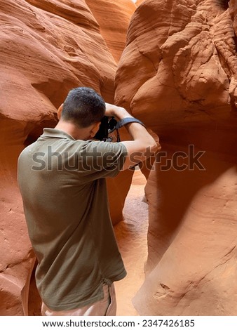 Antelope Canyon X is a slot canyon in Page, Arizona, USA, located in the exact same Antelope Canyon as the famous Upper and Lower Antelope Canyons. Nature photographer taking pictures outdoors.