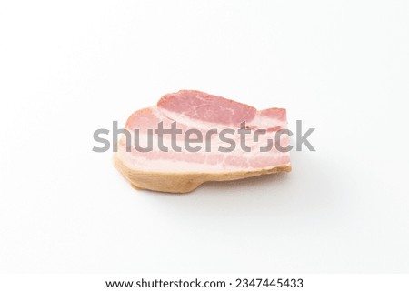 Block bacon on white background.