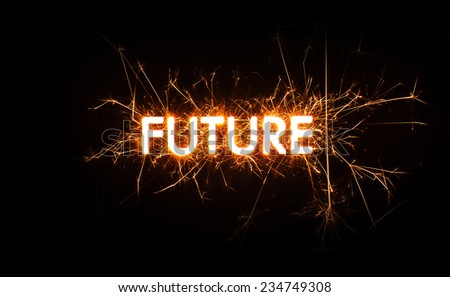 The word Future set in sparklers on black background.