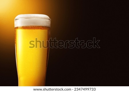 The glass of cold beer. International beer day concept