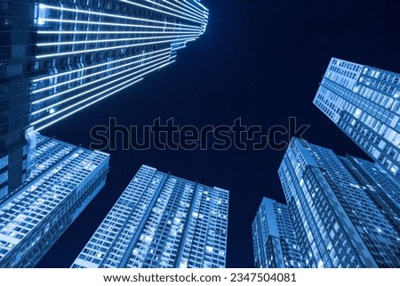 Night illuminated office buildings. High angle view