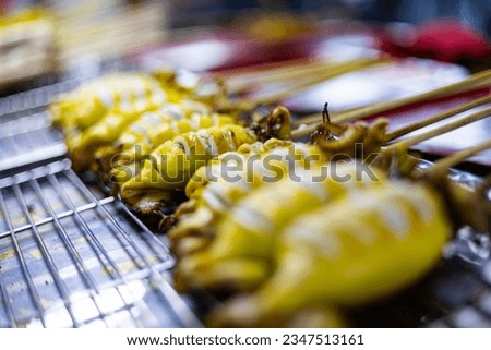 Grilled Squid On A Tray, Backgrounds for advertisements and wallpapers in food and cooking scenes. Actual images in decorating ideas.