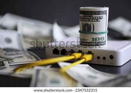 internet router and one hundred dollars. Communication internet cost concept