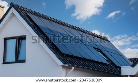 Newly build houses with solar panels attached on the roof , Solar system on a roof Own home Royalty-Free Stock Photo #2347538809