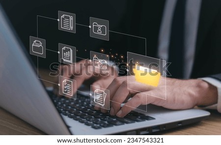 Document Management System (DMS), software to store, organize, track, and manage digital documents. Centralized repository for efficient creation, storage, retrieval, and distribution. Royalty-Free Stock Photo #2347543321