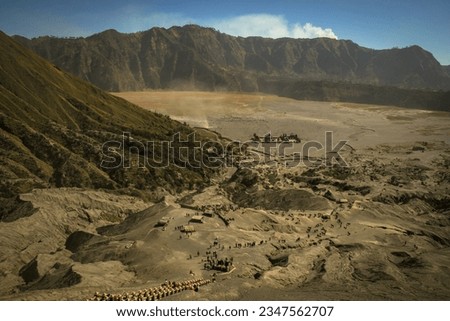 Hiking on Mount Bromo, photos appear from below and from the top of the crater