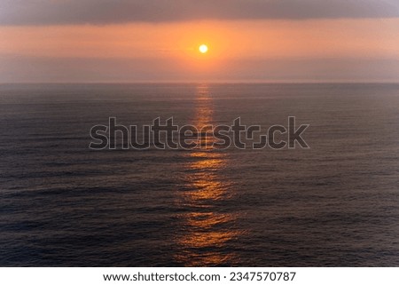 The sun rising over the East Sea in Jeongdongjin, Korea Royalty-Free Stock Photo #2347570787