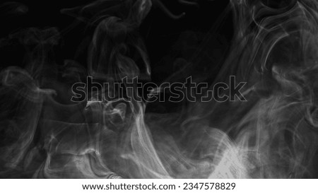 Smoke texture. Vapor swirl. Transparent steam. Defocused gray smog cloud floating on dark black free space abstract background.