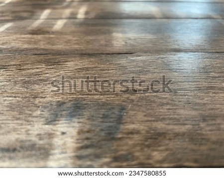 Close up of dark brown wood texture background.