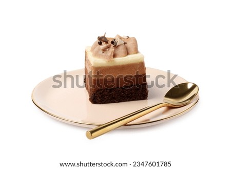 Piece of triple chocolate mousse cake and spoon on white background Royalty-Free Stock Photo #2347601785