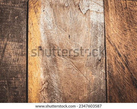 Picture of 3 vertical wooden panels, light brown, dark brown