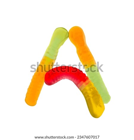 Letter A made of multicolored gummi worms and isolated on pure white background. Food alphabet concept. One letter of the set of sweet food font easy to stacking