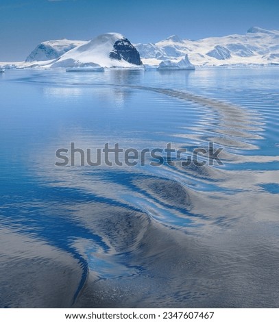 Zodiac wake ripples; Antarctica, Bay of Antarctica, Blue Ocean, Blue Sky on Sea