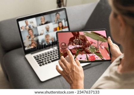 Euphoric winner watching a laptop on a desk winning at home Royalty-Free Stock Photo #2347637133