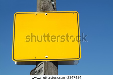 A blank yellow street sign.