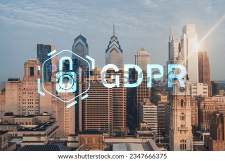 Aerial panoramic cityscape of Philadelphia financial downtown, USA. City Hall Clock Tower at sunrise. GDPR hologram, concept of data protection regulation and privacy for all individuals in EU Area