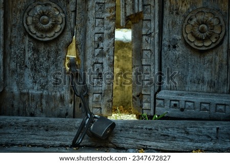 Aged door lock, a silent sentinel guarding secrets of bygone eras.