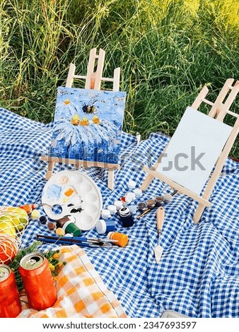 drawing pictures at a picnic in the park