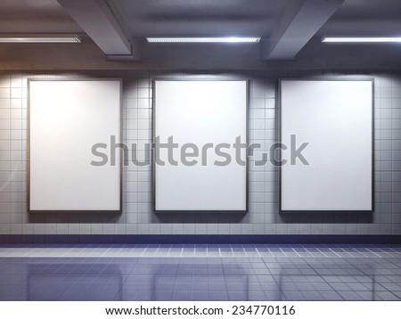 three big vertical poster on metro station Royalty-Free Stock Photo #234770116