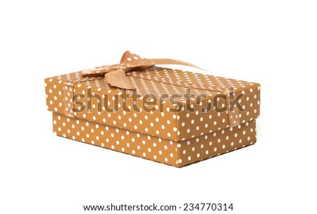 Brown gift box with bow isolated on white.
