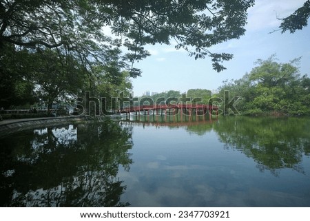 Landscape view of Hoan Kiem lake with The Huc Bridge within Hanoi, Vietnam Royalty-Free Stock Photo #2347703921