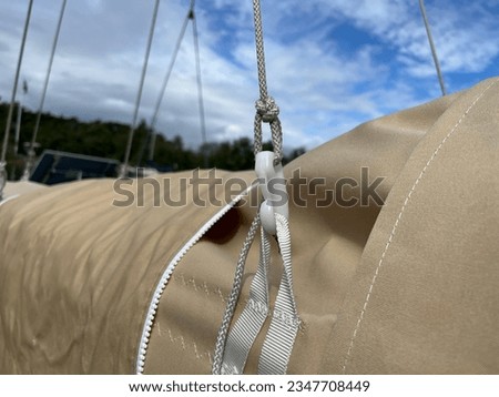 Picture of a cover, a sail, taken close up
