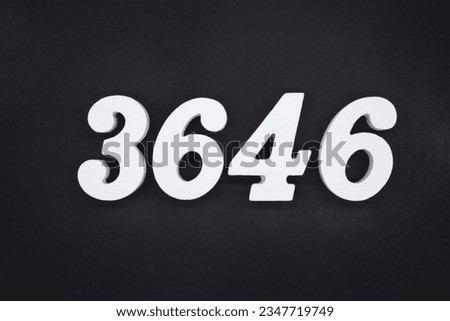 Black for the background. The number 3646 is made of white painted wood.