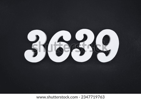 Black for the background. The number 3639 is made of white painted wood.