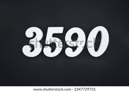 Black for the background. The number 3590 is made of white painted wood.