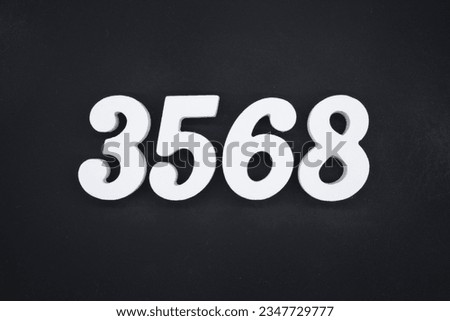 Black for the background. The number 3568 is made of white painted wood.