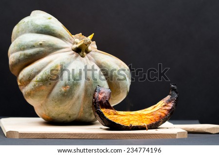 Baked pumpkin slice, pumpkin and pumpkin seeds 