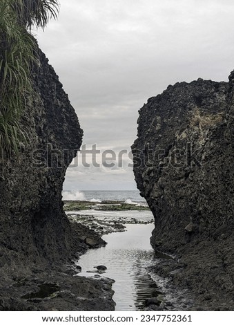 Natural rocks setting by the sea