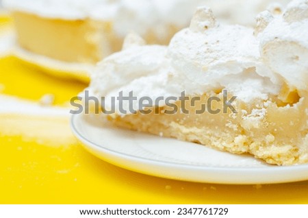 Lemon Meringue Pie, butter enriched shortcrust pastry filled with creamy lemon and topped with meringue, lemon tart