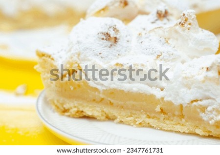 Lemon Meringue Pie, butter enriched shortcrust pastry filled with creamy lemon and topped with meringue, lemon tart