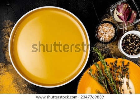 Mockup for menu, empty big orange plate with spices, menu mockup, top view.